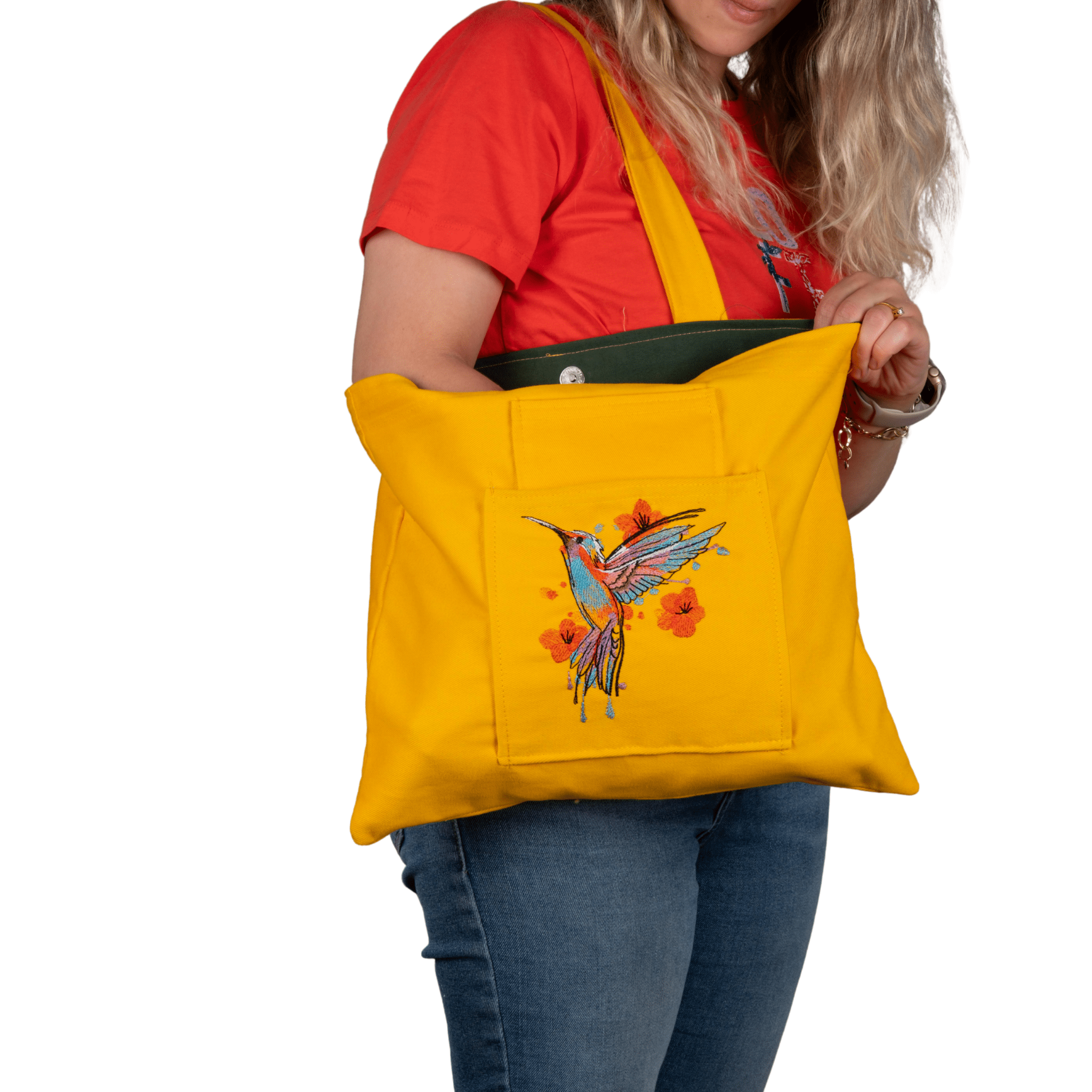 Colorful hummingbird embroidered canvas bag – yellow body, worn by model – Canvasbag