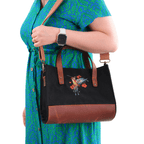 Model holding Hummingbird bag with canvas and genuine leather details - canvasbag