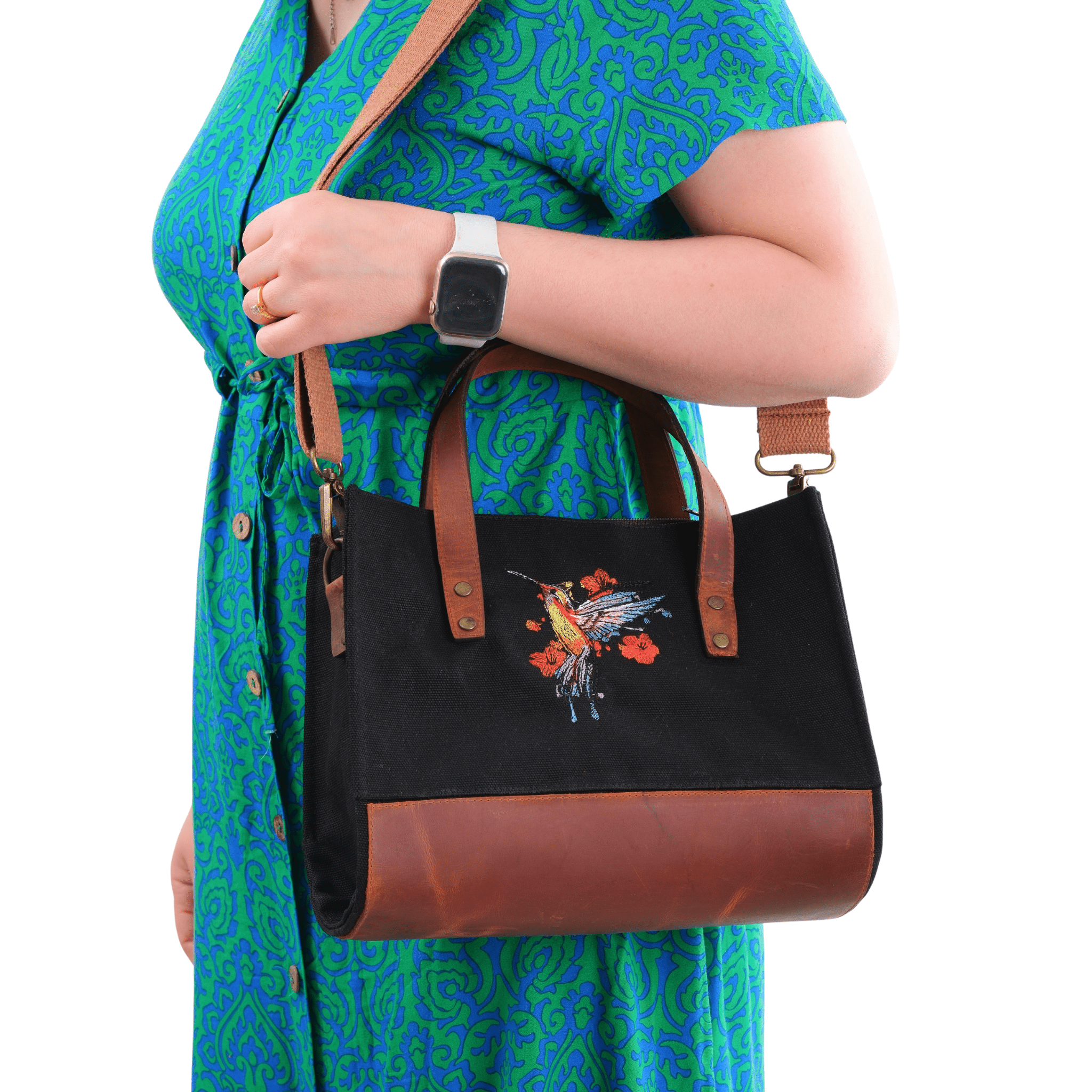 Model holding Hummingbird bag with canvas and genuine leather details - canvasbag