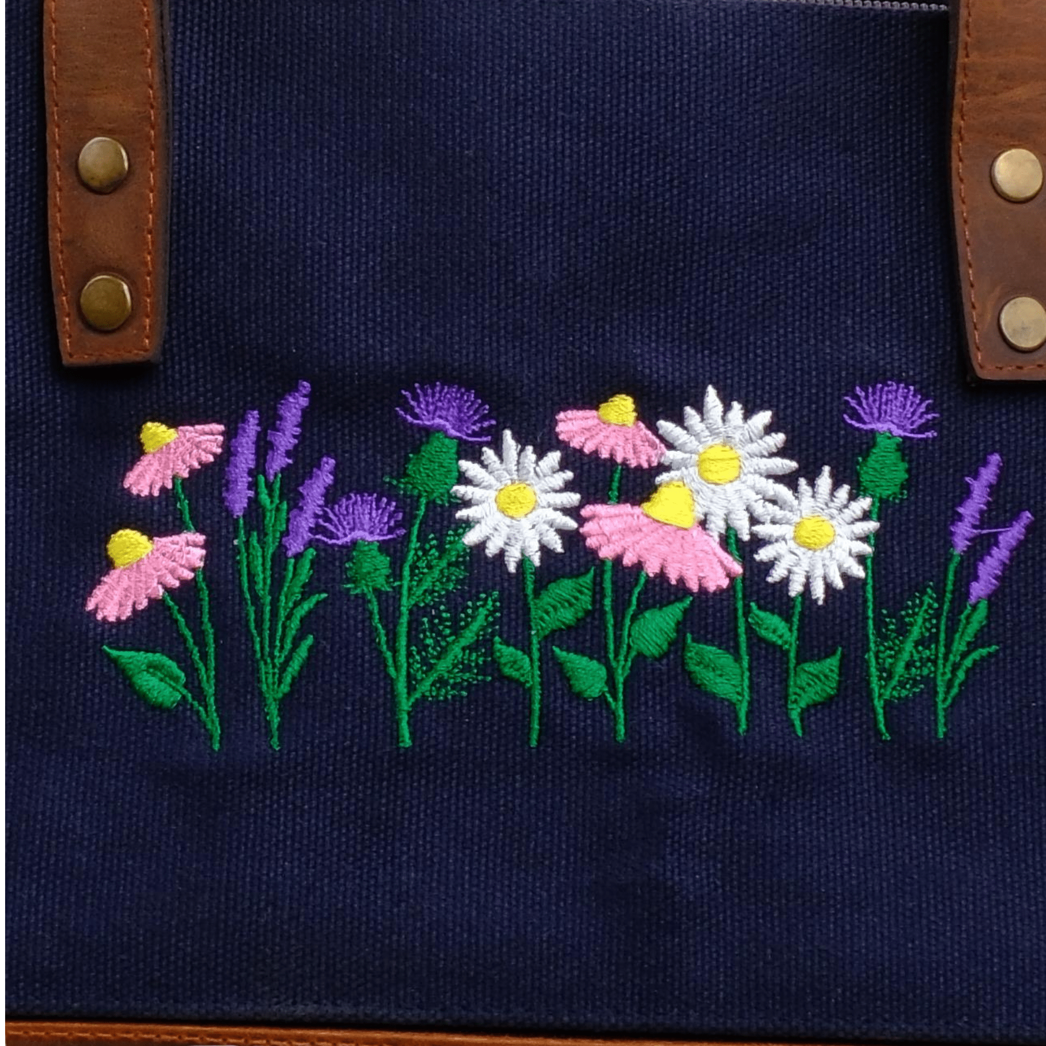 lavender and daisy embroidery on navy canvas bag flap - Canvasbag