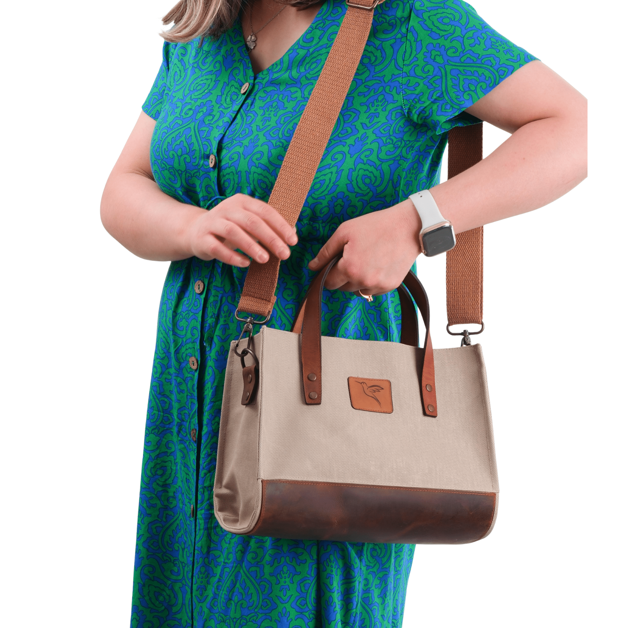 Beige canvas & leather bag worn by model – Nevas collection