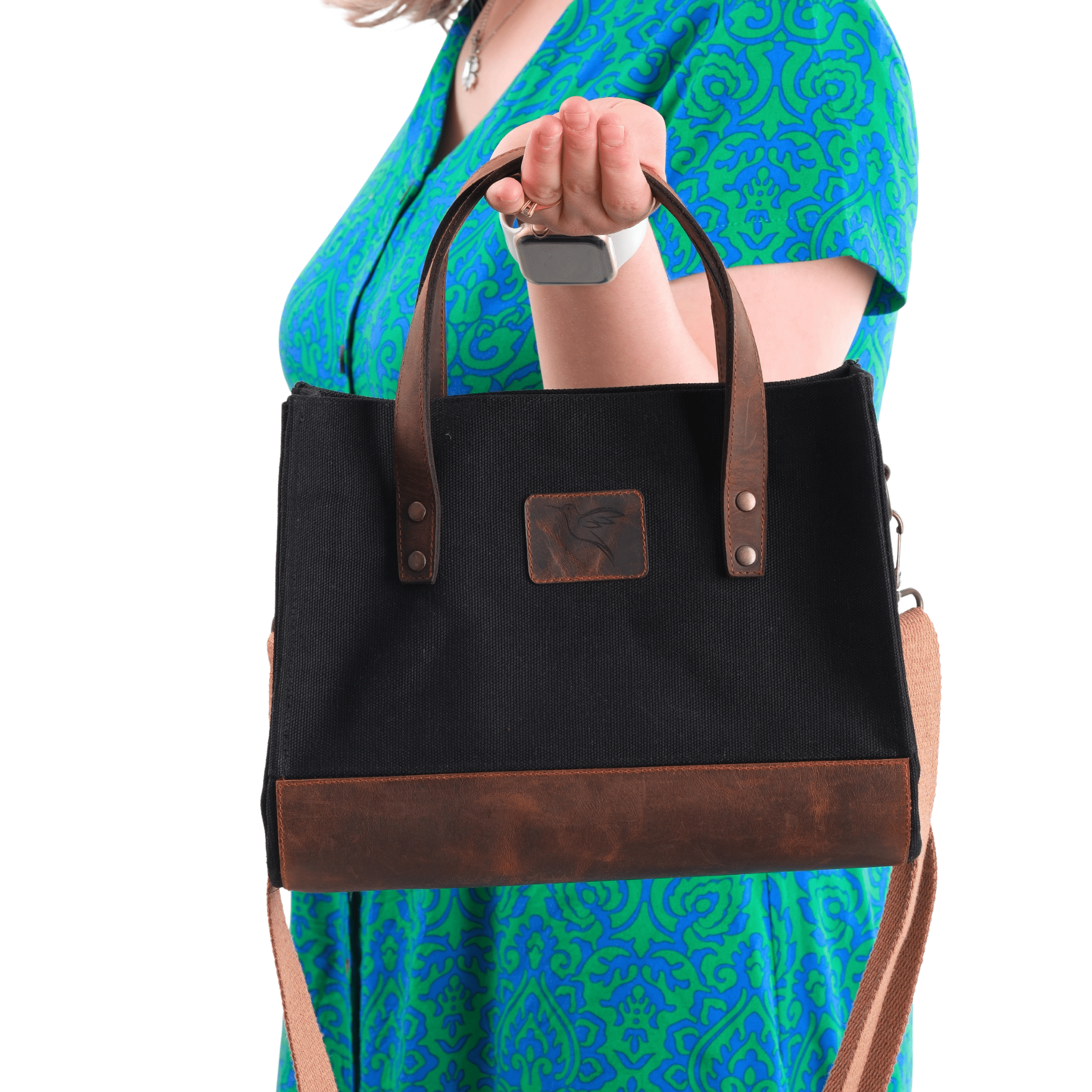 Black canvas & leather handbag worn by model – Nevas collection