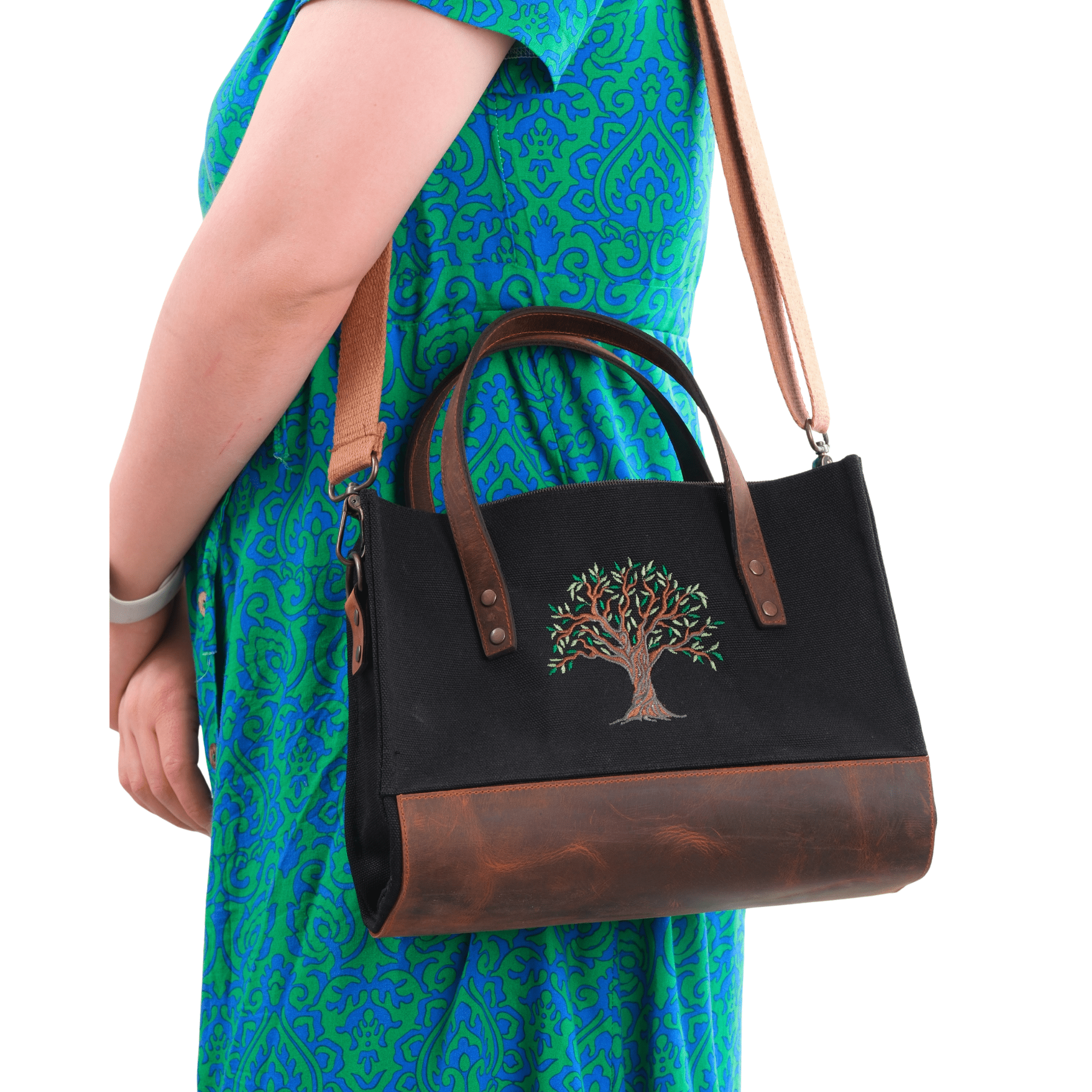 Black canvas Olive Tree embroidered leather shoulder bag on shoulder