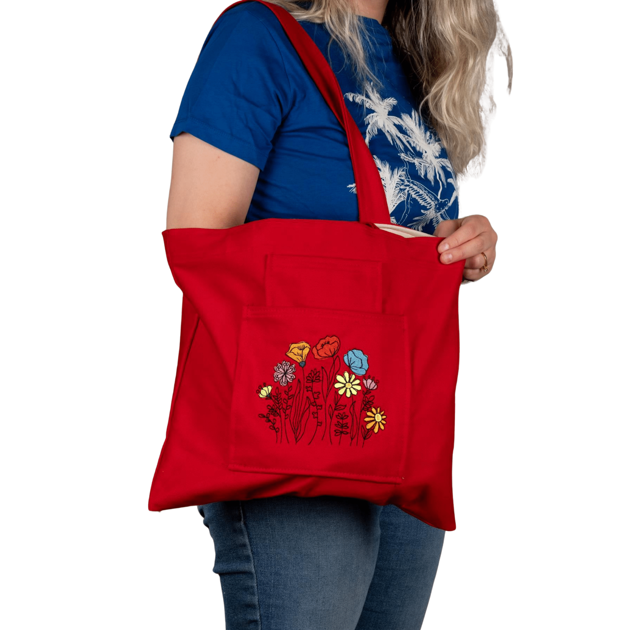 Model with red canvas tote bag embroidered with poppy flowers – Canvasbag